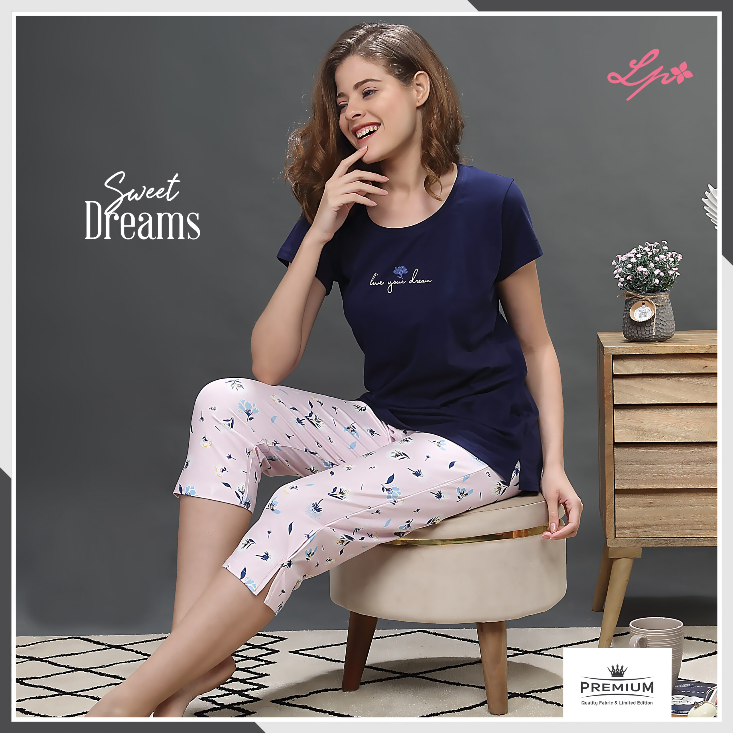 8024-A Little Pink Solid Navy T-Shirt With Printed Capri Set.